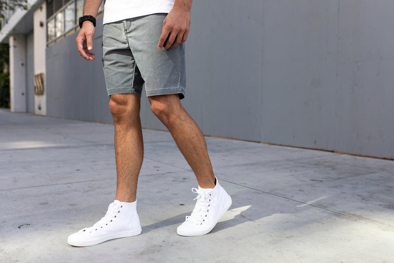 man, wearing, shorts, on, sidewalk
