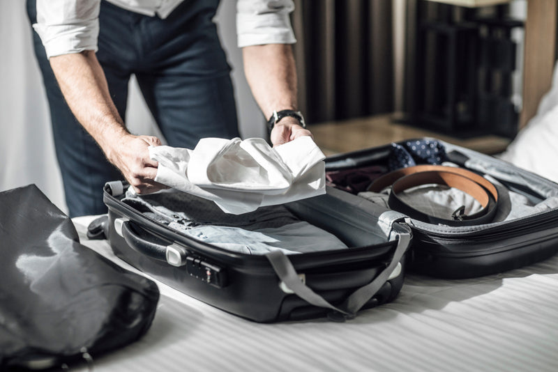 lying your things out help you decide what menswear to pack for summer travel